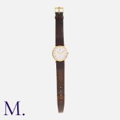 OMEGA GENEVE, A Vintage Gents Wristwatch in 9k yellow gold, the silvered dial with gold baton hour