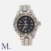 BREITLING, A SUPEROCEAN CHRONOMETER WRISTWATCH in stainless steel. Black dial with blue hour markers