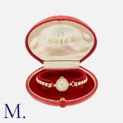 OMEGA, A Vintage Ladies Cocktail Watch, in 9k yellow gold, manual wind movement. Rolled gold