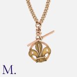 An Albert Chain with Pendant in 9ct gold curb chain with T-bar and fleur-de-lys pendant. Marks for