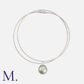 A Tahitian Pearl Pendant and Collar in 18K white gold, set with a single green-silver Tahitian pearl