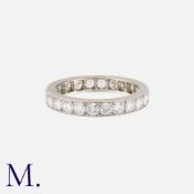 A Diamond Eternity Ring in platinum, set all around with round cut diamonds totalling