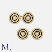 A Pair Of Enamel And Pearl Cufflinks in yellow gold, each designed as two discs set with a central