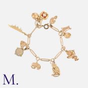 A Charm Bracelet in 9k yellow gold, comprising a series of interlocking links suspending various