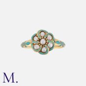 An Antique Pearl and Enamel Memorial Ring in yellow gold, the centre set with seven pearls in a