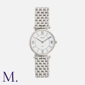 VAN CLEEF & ARPELS. A Ladies Wristwatch with ultra-thin stainless steel case, white dial with