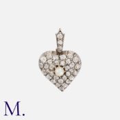 An Antique Old Cut Diamond And Pearl Pendant in yellow gold and silver, designed as heart set