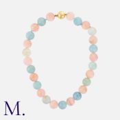 An Aquamarine And Morganite Bead Necklace in 9k yellow gold, comprising a row of alternating