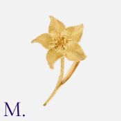 HERMES. A Flower Brooch in 18K yellow gold, with five-petal textured flower. Signed Hermes Paris and