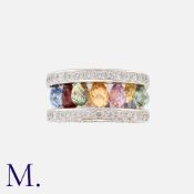 A Multi-Gem And Diamond Ring in 18k white gold, comprising two rows of round cut white diamonds,