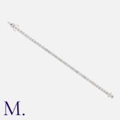 A 10.30ct Diamond Line Bracelet in 18k white gold, comprising a series of interlocking links each