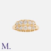 An Old Cut Diamond Ring in yellow gold, comprising two rows of graduated old cut diamonds