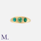 A Turquoise Gypsy Ring in 18k yellow gold, set with three cabochon turquoise. British hallmark for