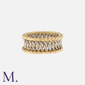 HERMES. A Woven Band in 18K yellow and white gold, with solid mesh design. Size: M1/2 Weight: 7.6g