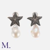 A Pair Of Pearl And Black Diamond Earrings in 18k white gold, the tops designed as a black diamond