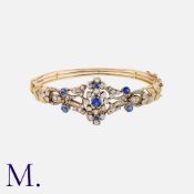 A Sapphire and Diamond Bangle in gold and silver, set with old cut and rose cut diamonds, together