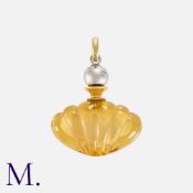A Carved Glass And Diamond Scent Bottle in 18k gold, the carved scalloped glass bottle set to the