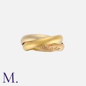 CARTIER. A Cartier Trinity Ring in 18K rose, white and yellow gold. Engraved 'Les Must de Cartier'