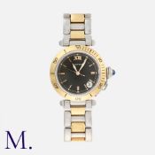 CARTIER. A Pasha de Cartier Wristwatch in 18K yellow gold and stainless steel, with butterfly clasp,