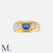 MELLERIO. A Sapphire and Diamond Ring in 18K yellow and white gold, set with an oval-cut sapphire to