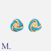 A Pair Of Enamel Earrings in yellow gold, comprising a knot motif, with light blue enamel detailing.