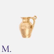 A Jug Charm in 9ct yellow gold Size: Weight: