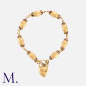 An Antique Enamel Bracelet in 15k yellow gold, comprising a series of eight links decorated with