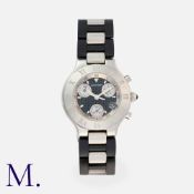 CARTIER. A Must 21 Chronoscaph Wristwatch with steel case, featuring a black dial, chronograph