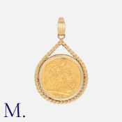 A Gold Sovereign with a 9K gold rope-work design setting (hallmarked) and bale (stamped 375).