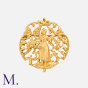 An Art Nouveau Brooch in 18K yellow gold with a bucolic scene depicting a young lady picking