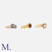 A Collection Of Three Antique Rings comprising two gem-set rings in yellow gold, and one diamond set