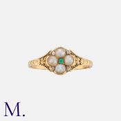 A Victorian Emerald, Pearl And Diamond Ring in yellow gold, comprising a quatrefoil motif of