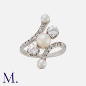 An Art Nouveau Natural Pearl And Diamond Ring in 18k white gold, comprising three natural pearls,