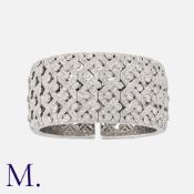 An Impressive Diamond Bangle in 18K white gold, pavé set with approx. 23.0ct of round cut