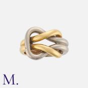 A Gold Knot Ring in 18K yellow and white gold. Stamped '750' inside the band with French import mark