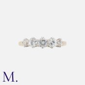 A Vintage Diamond Five Stone Ring in 18k yellow gold and platinum, principally set with a round