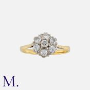 A Diamond Cluster Ring in 18k yellow gold, comprising a cluster of round cut diamonds totalling