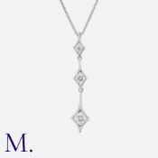 DE BEERS, A Diamond Pendant Necklace in 18k white gold, comprising a trio of graduating round cut