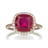 SYNTHETIC RUBY AND GEM SET RING,