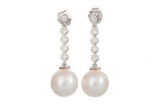 PAIR OF PEARL AND DIAMOND EARRINGS,