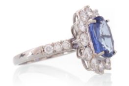 SAPPHIRE AND DIAMOND CLUSTER RING,