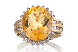 CITRINE AND TOPAZ RING,