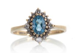 TOPAZ AND DIAMOND RING,