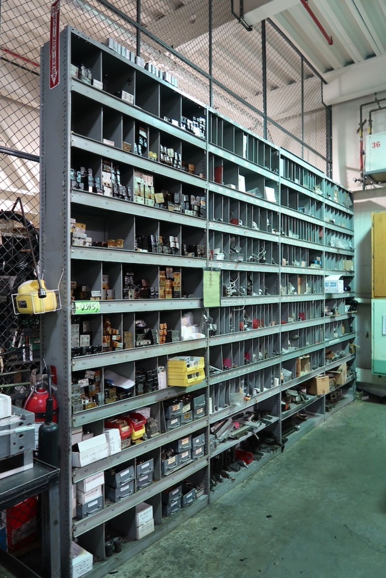 (4) Sections of Adjustable Racking and (2) 2-Door Cabinets with Misc. Machine Parts, Etc.