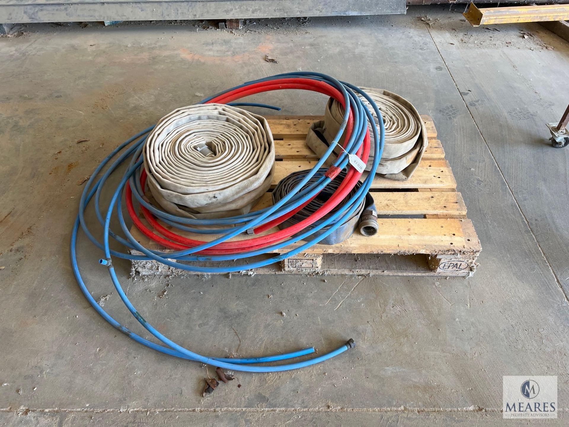 Pallet of Fire Hoses and PEX Tubing