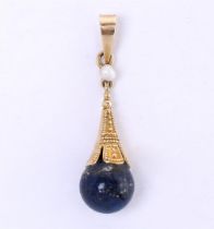 14kt yellow gold pendant set with lapis and freshwater pearl. Pendant weight: 1.2 grams