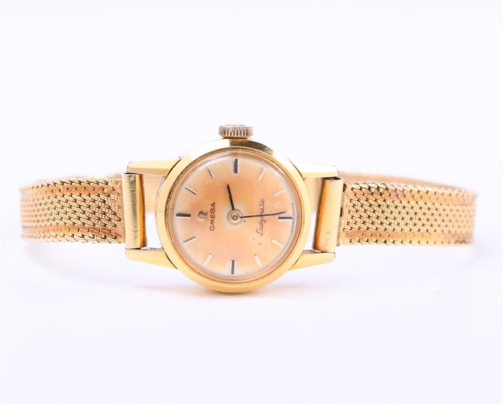 14 kt yellow gold Omega wind-up ladies watch with Milanese strap