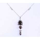14kt white gold Otazu Diamond necklace set with smoky quartz, diamond, ruby and crystal
