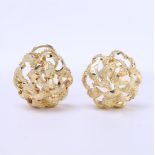 14 kt yellow gold ear clips (without plug.) Weight 9.1 grams for both ear clips