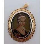 14 kt yellow gold pendant with a portrait. Hand-painted on a porcelain plaque